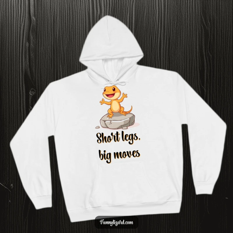 Funny orange lizard hoodie, depicting a happy lizard with short legs doing a little jig on a rock, cozy and fun.