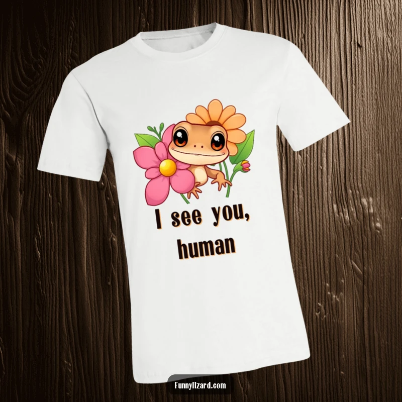 Funny brown lizard t-shirt, featuring a curious lizard with large eyes peeking mischievously from behind a vivid, colorful flower.